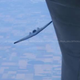 Illustration for article titled Is This Proof That The US Air Force Can Aerially Refuel Stealth Drones?